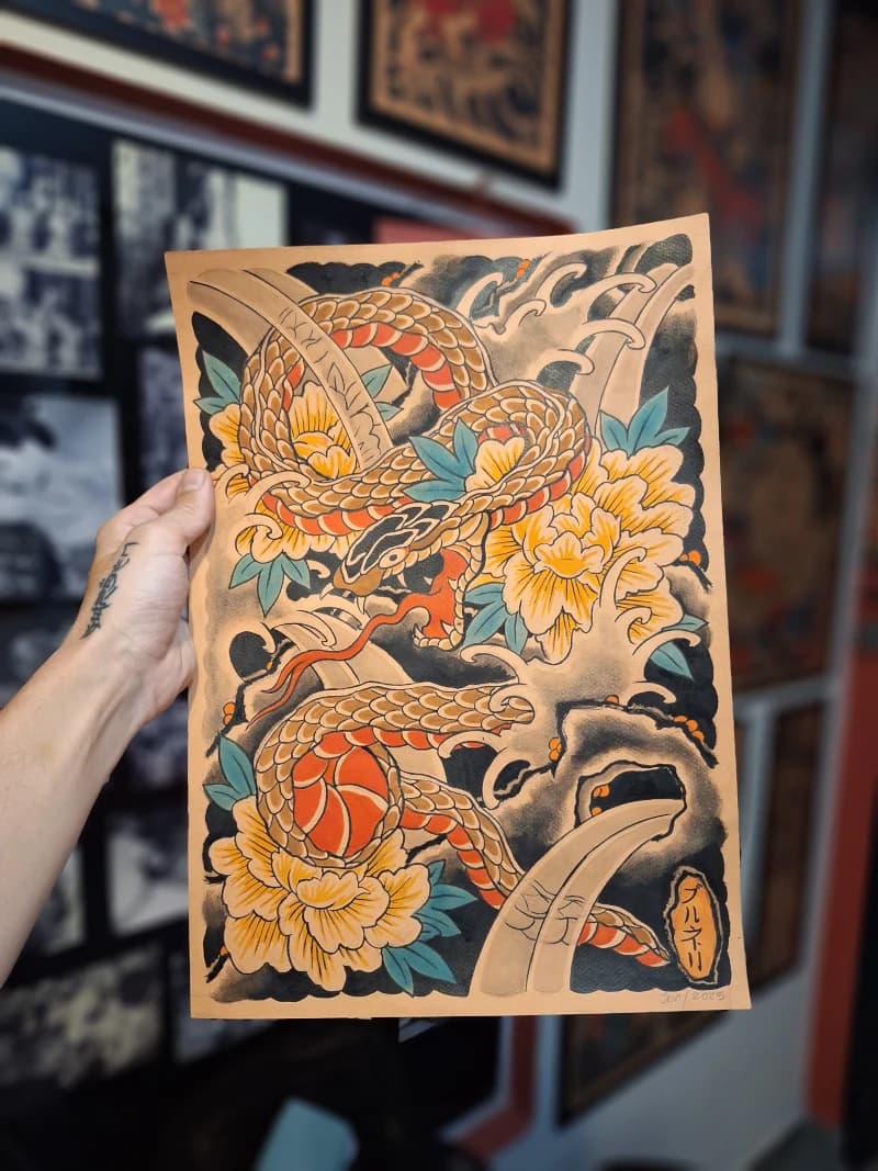 Desenho tradicional de serpente e flores feito à mão por Felipe Brunelli
